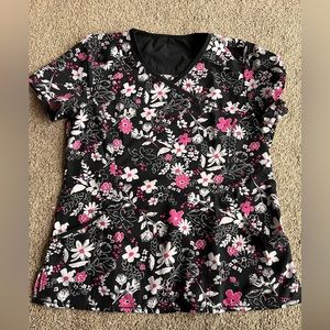 Woman’s Cherokee Infinity pink floral scrub top size Large